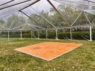 Dance floor inside a clear-top tent